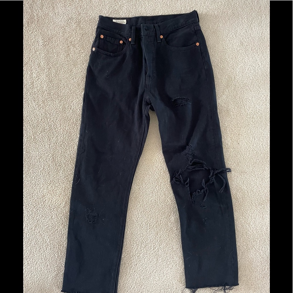 Levi’s 501 black ripped jeans